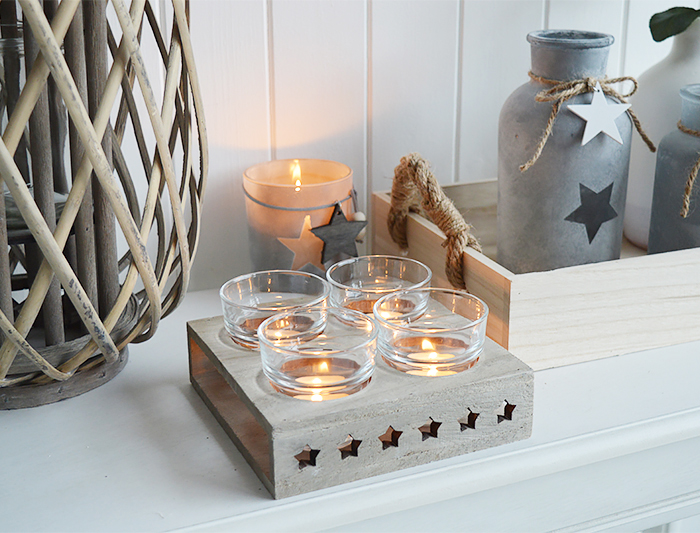 Nantucket candle holder with stars from The White Lighthouse. New England , coastal, country and white furniture and home interiors for the hallway, living room, bedroom and bathroom