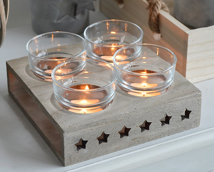 Nantucket candle holder with stars from The White Lighthouse. New England , coastal, country and white furniture and home interiors for the hallway, living room, bedroom and bathroom