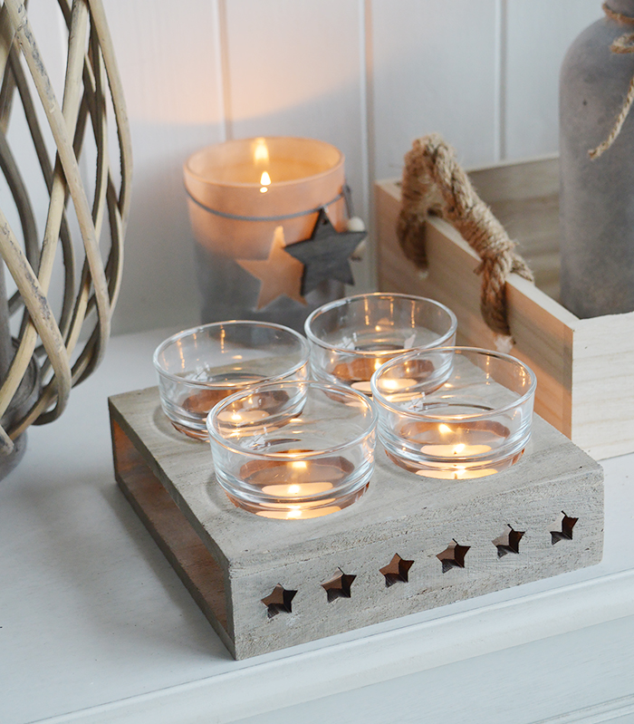 Nantucket candle holder with stars from The White Lighthouse. New England , coastal, country and white furniture and home interiors for the hallway, living room, bedroom and bathroom
