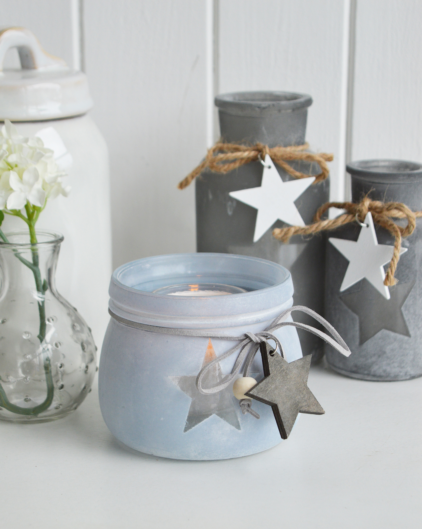 Etched glass  lantern candle holder with stars from The White Lighthouse. New England , coastal, country and white furniture and home interiors for the hallway, living room, bedroom and bathroom.