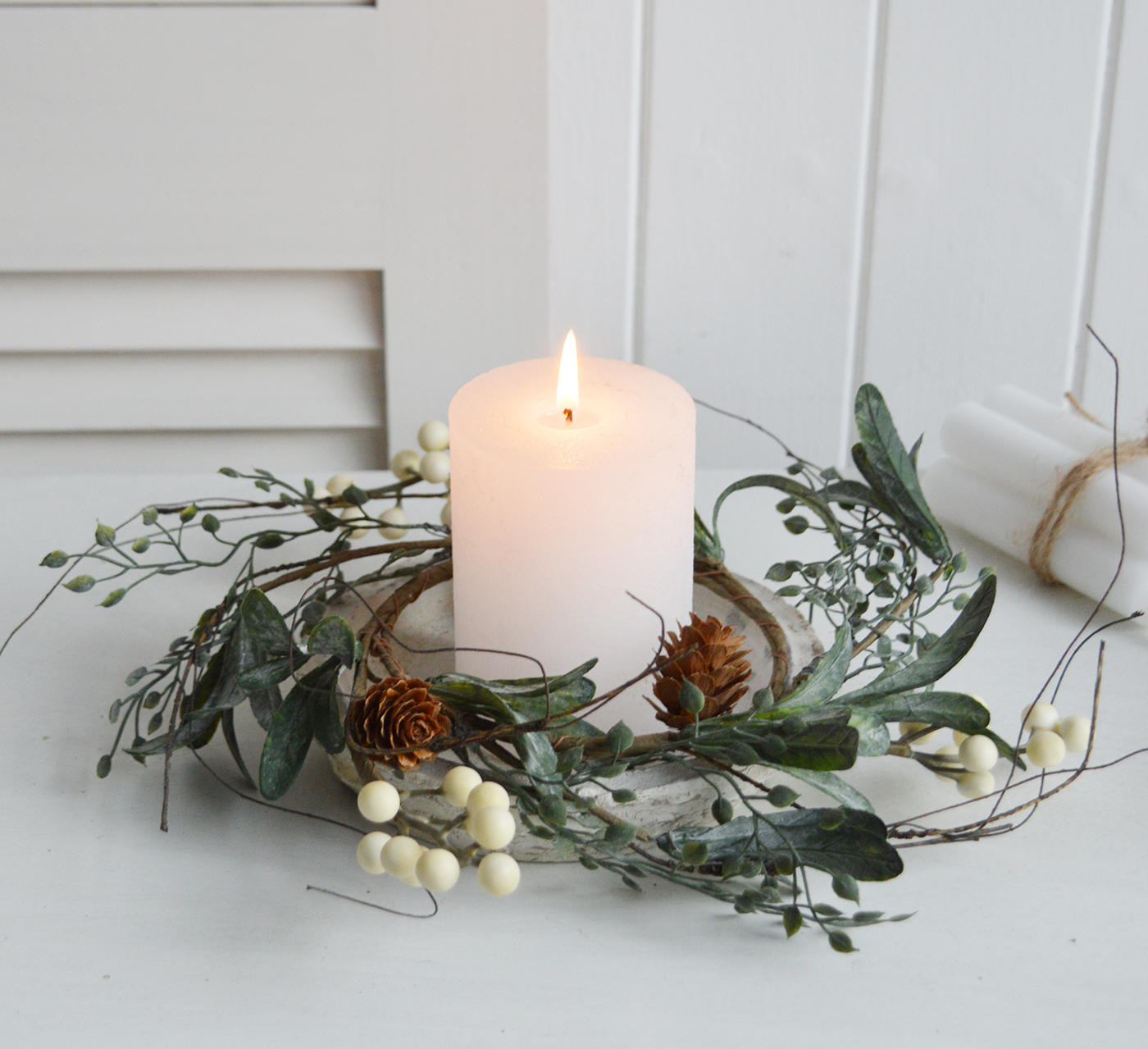 Create a beautiful centerpiece with this gorgeous winter candle ring with gently frosted leaves, little pinecones and contrasting white berries - Luxury Christmas table decoration