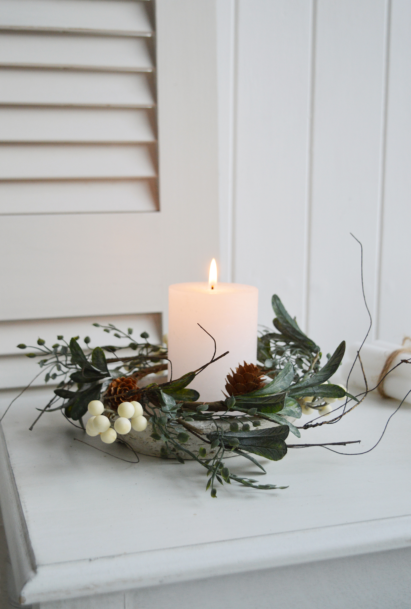 Create a beautiful centerpiece with this gorgeous winter candle ring with gently frosted leaves, little pinecones and contrasting white berries - Luxury Christmas table decoration