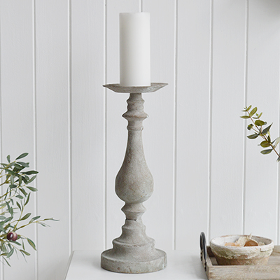 The Hampstead is a classic style tall candle holder in aged metal finish. A timeless candlestick that is stunning as a pair or singly on a table or mantle in the hallway living room or as a centre piece on the dining table
