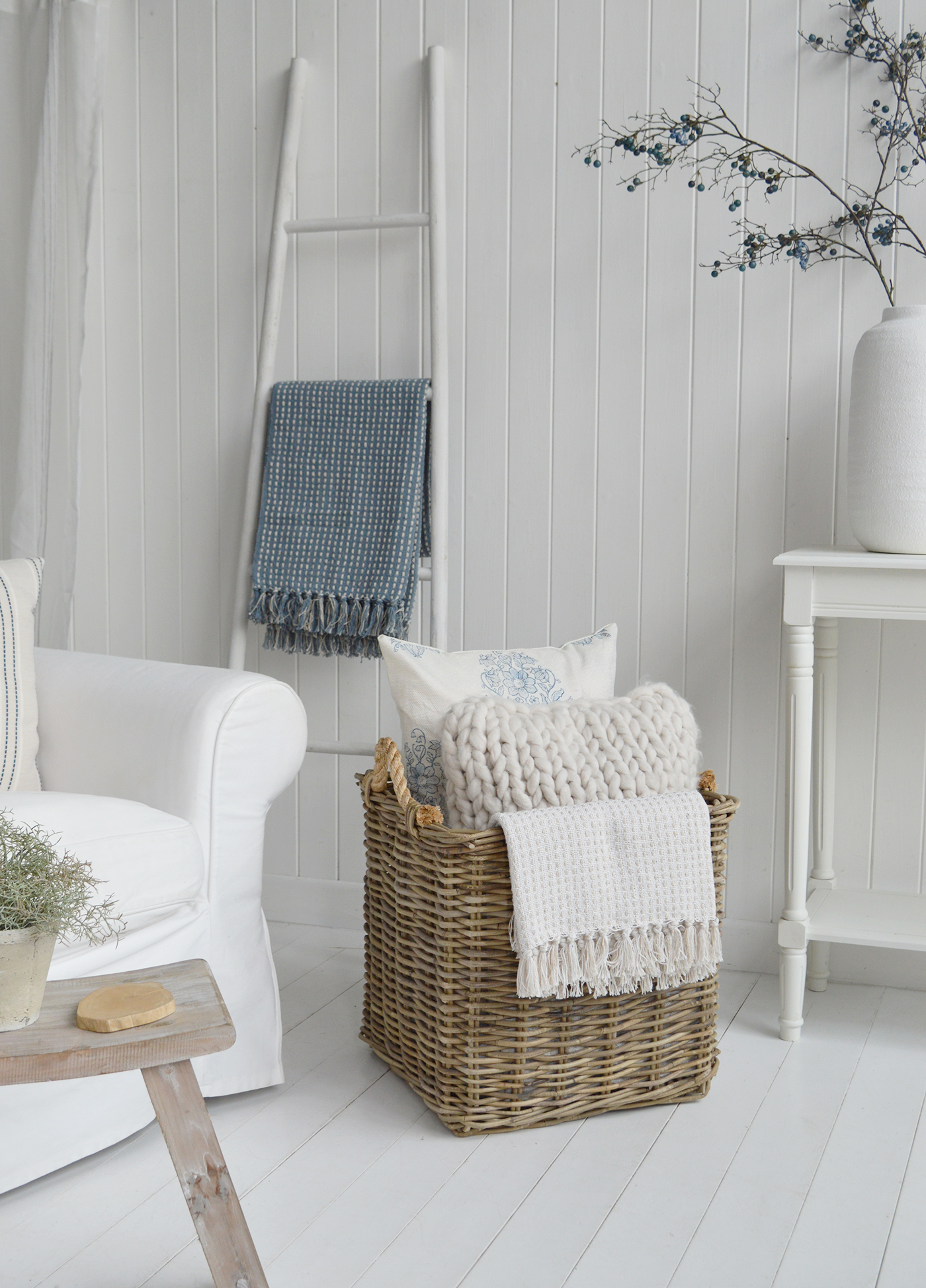 This large wicker storage basket is ideal for keeping logs neatly stored beside the fireplace.