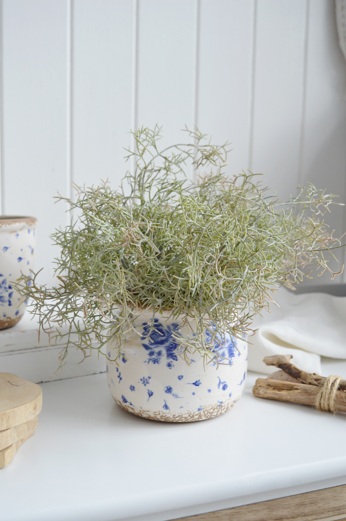 Coastal inspired ceramic pots with wide mouth and distressed blue rose decoration
