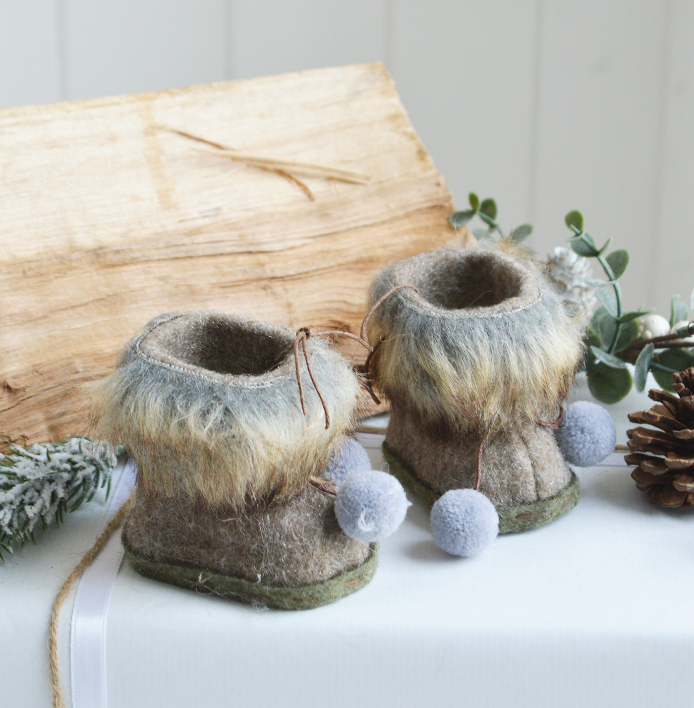 New England style Christmas Decor for cottage, farmhouse, coastal, country and city homes and interiors. Faux Fur boots - Ski Lodge New England style Christmas Decor