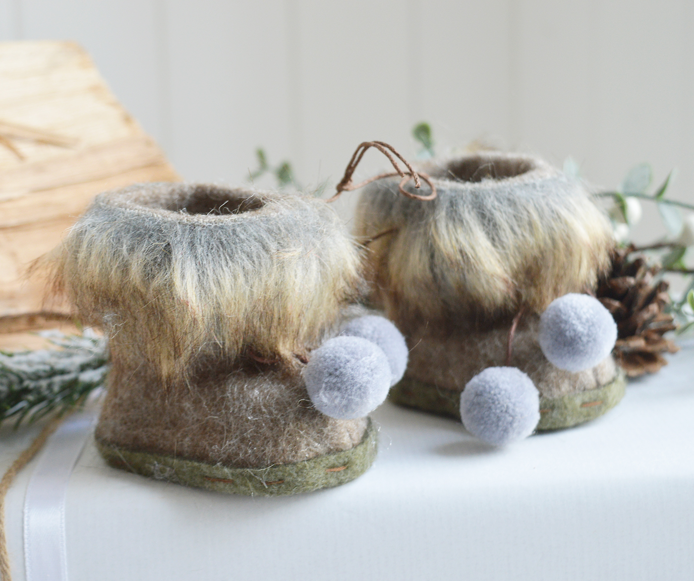 New England style Christmas Decor for cottage, farmhouse, coastal, country and city homes and interiors. Faux Fur boots - Ski Lodge New England style Christmas Decor
