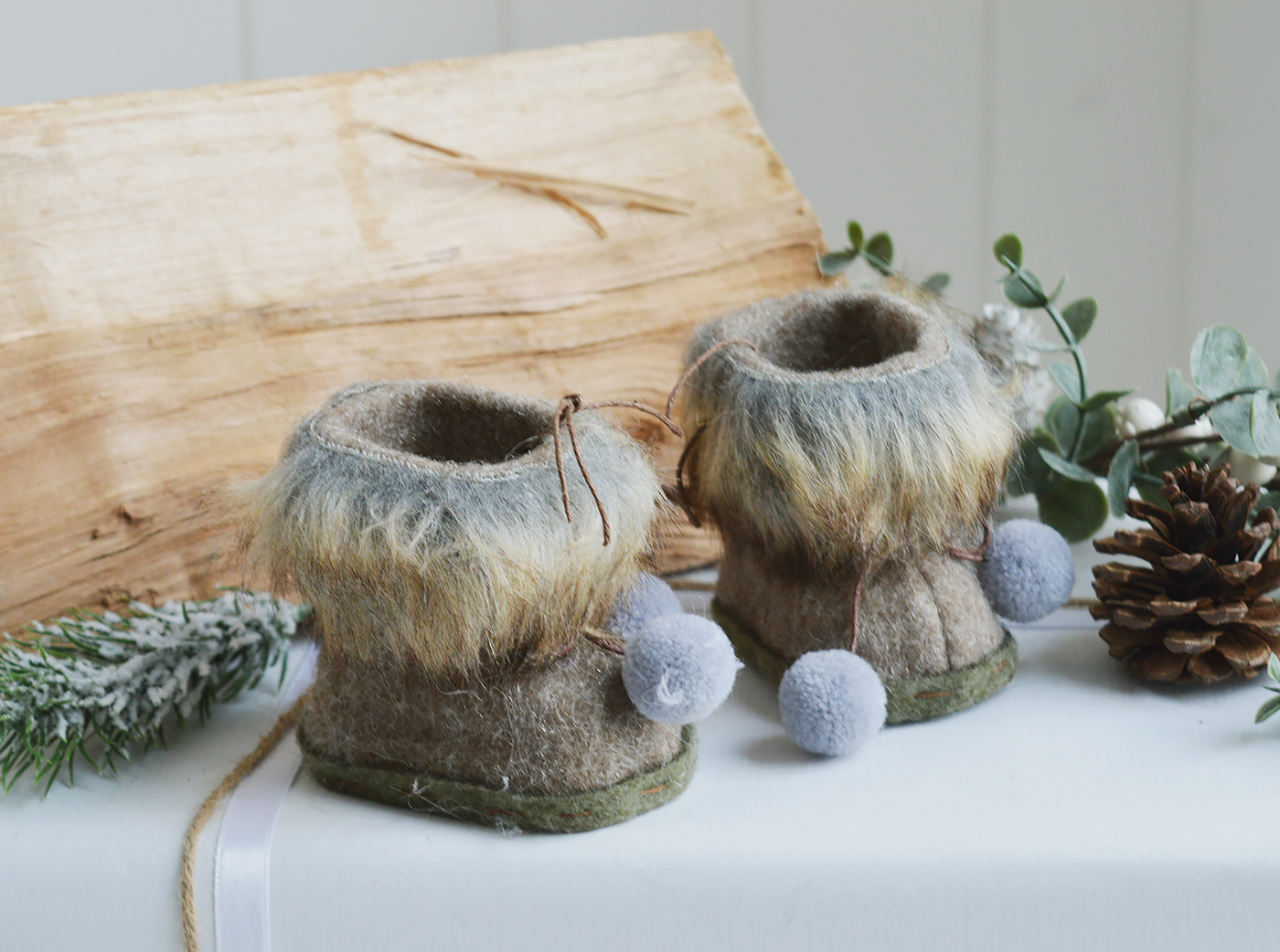 New England style Christmas Decor for cottage, farmhouse, coastal, country and city homes and interiors. Faux Fur boots - Ski Lodge New England style Christmas Decor