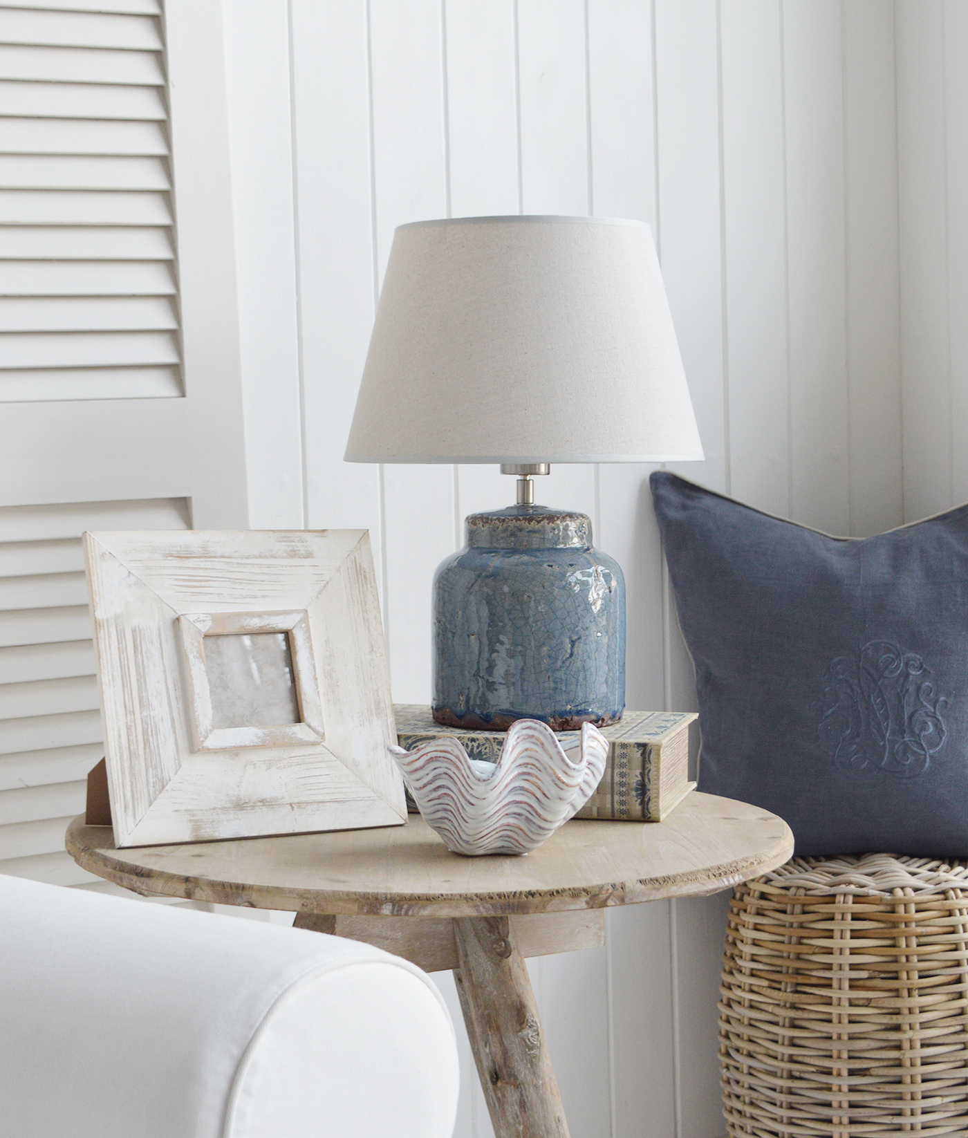 The Blue Comptom ceramic lamp alongside the Driftwood table, willow stool and Richmond cushion for texture and warmth to a New England or Hamptons style interior