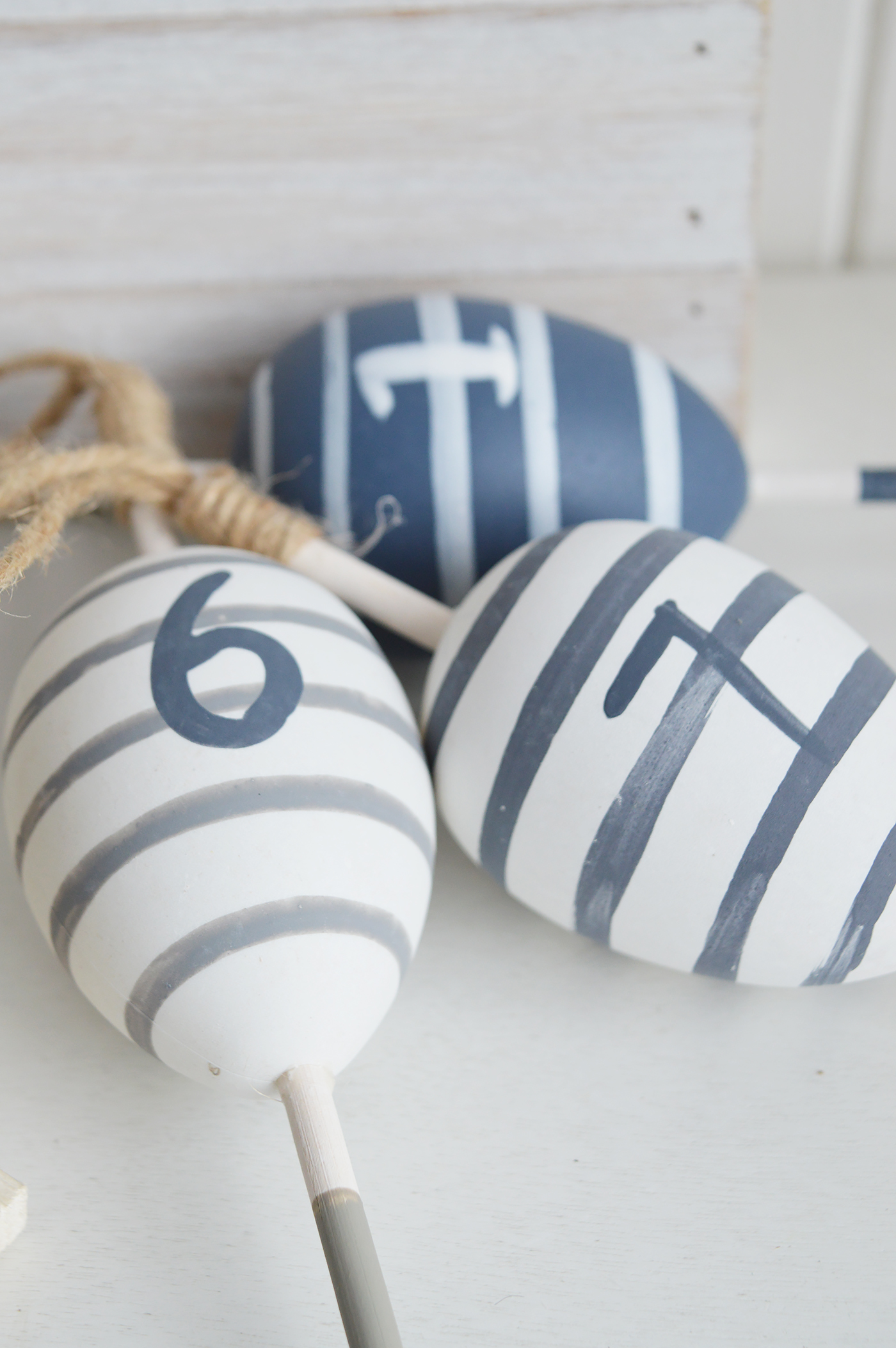 Nautical, coastal and beach home decor accessories and Furniture from The White Lighthouse Furniture - Set 3 decorative hanging floats. New England Coastal style interior design