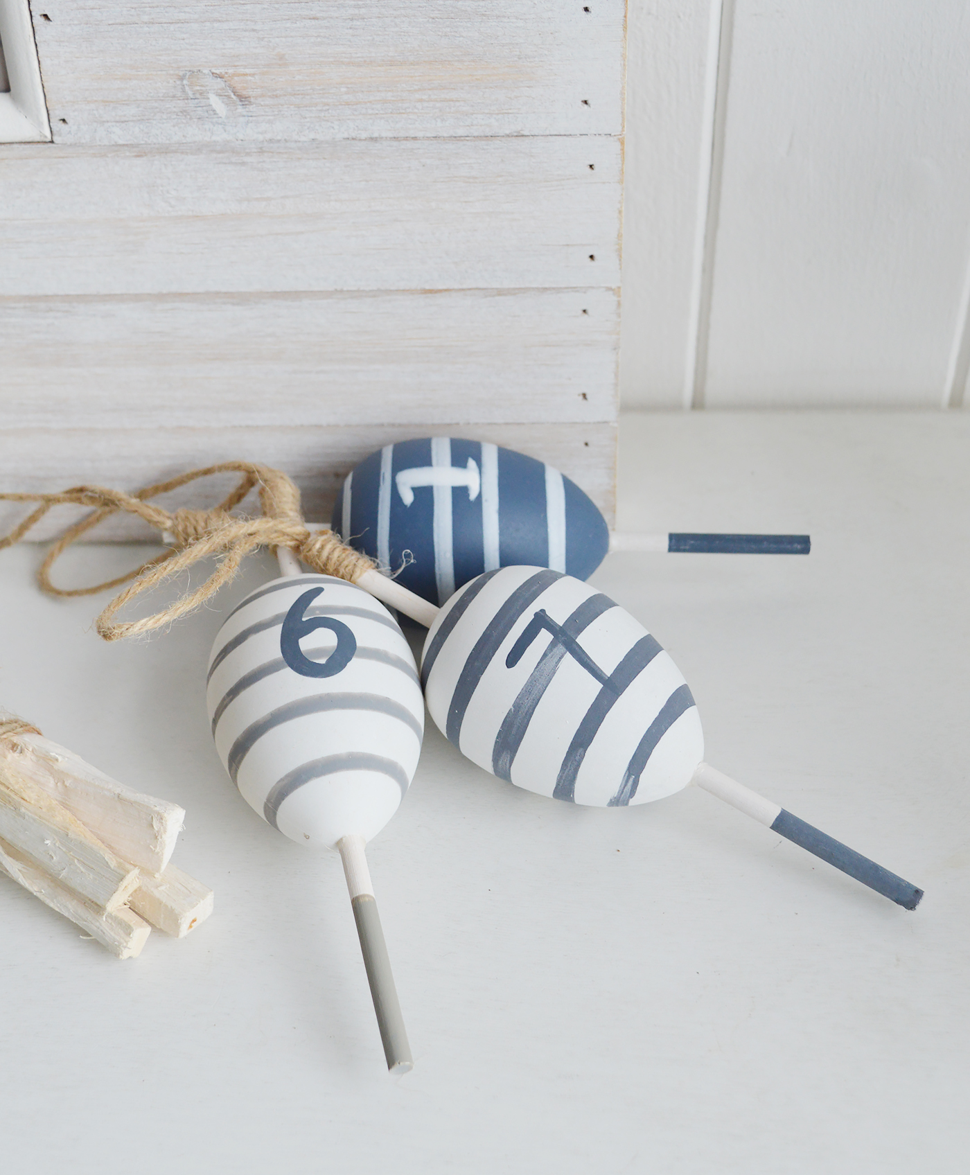 Nautical, coastal and beach home decor accessories and Furniture from The White Lighthouse Furniture - Set 3 decorative hanging floats. New England Coastal style interior design