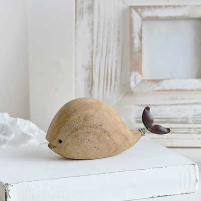 Little driftwood wooden whale for decorating a coastal room