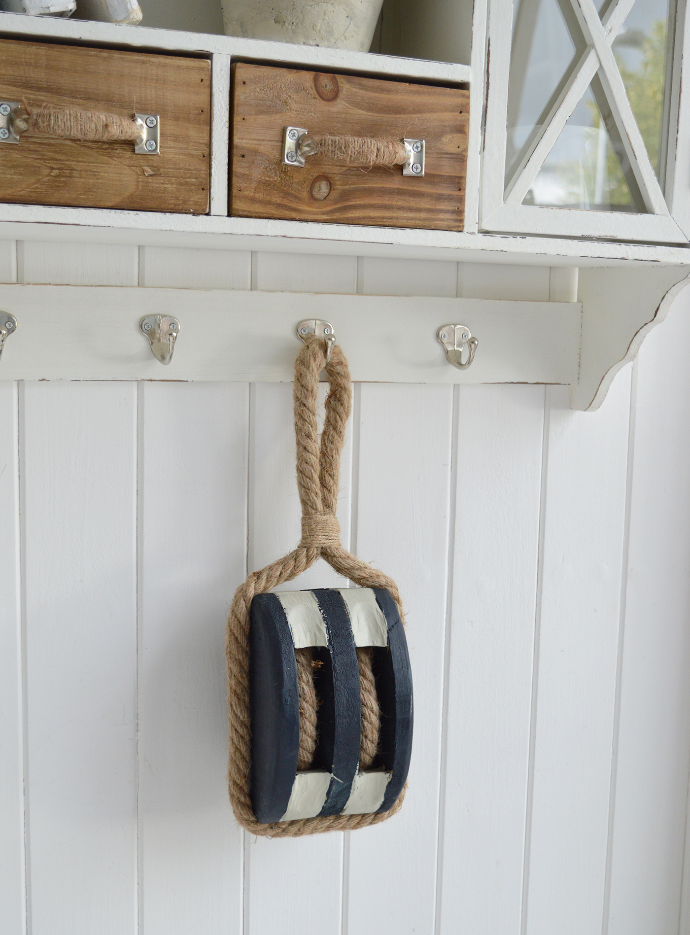 Rustic navy and white pulley block accent piece for coastal interiors design