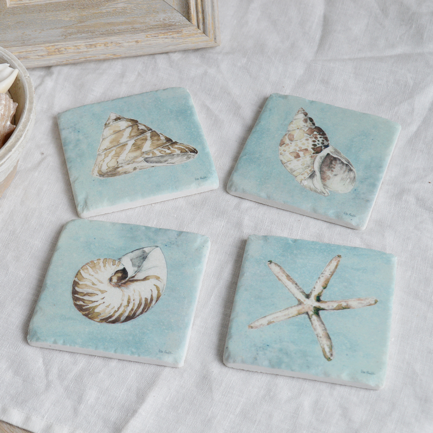 Hamptons Beach House Coastal Home Interiors and Furniture - A set of 4 shell Coasters