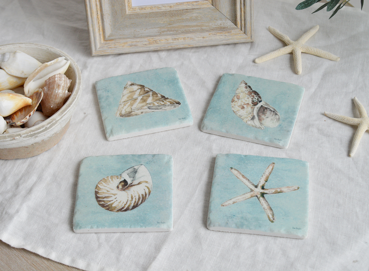 Hamptons Beach House Coastal Home Interiors and Furniture - A set of 4 shell Coasters