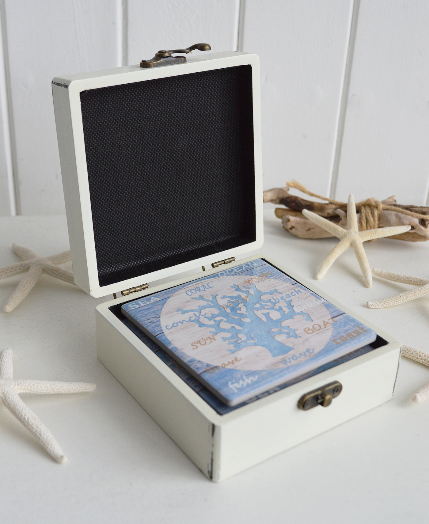 Perfect for Hamptons and New England interiors, these ceramic coasters combine practical surface protection with timeless seaside style.