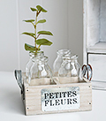 Woodn crate with 4 small vases