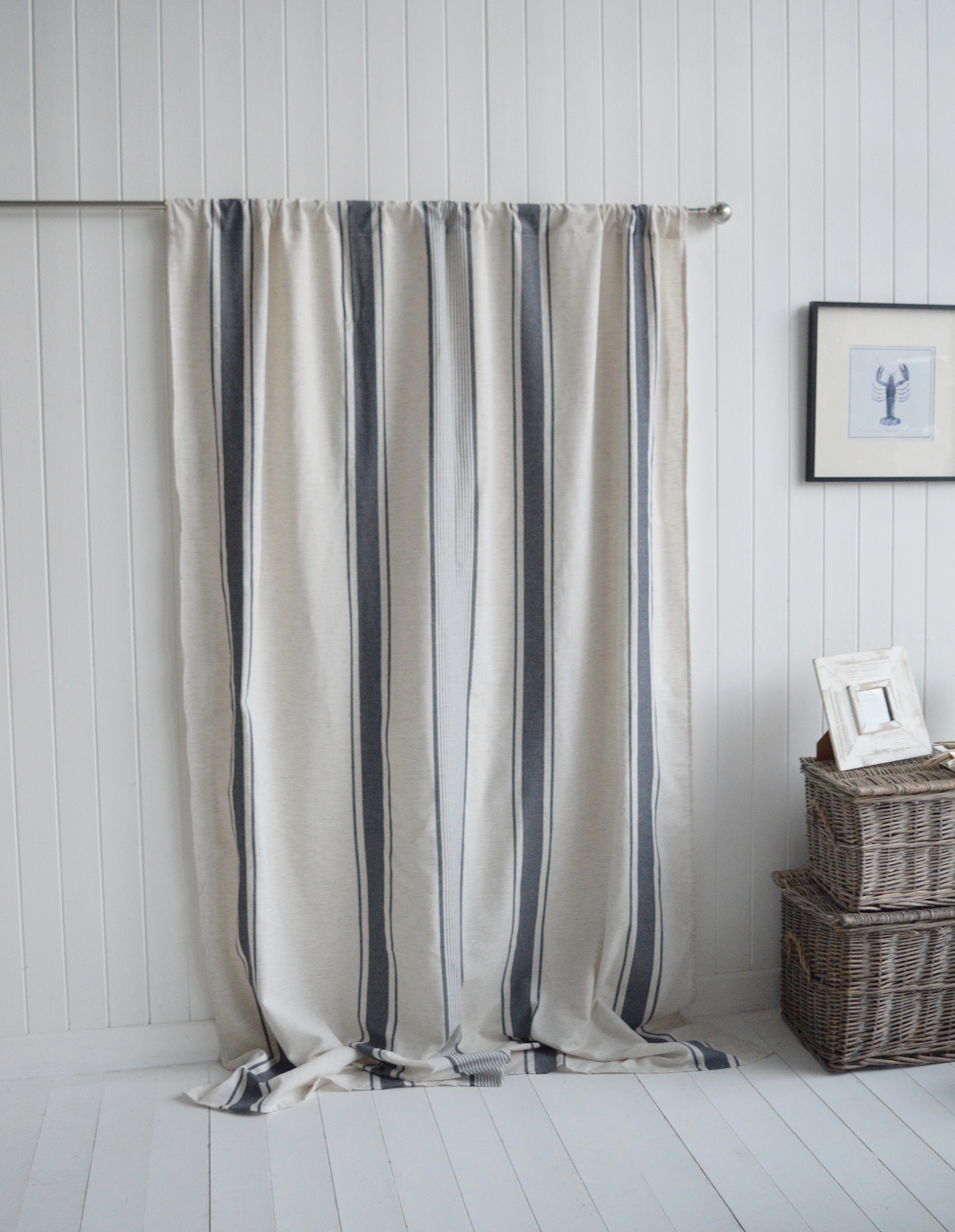 The Cape Shore Stripe Curtain brings cool coastal ease with navy stripes on a soft linen base — perfect for fresh, relaxed seaside interiors.