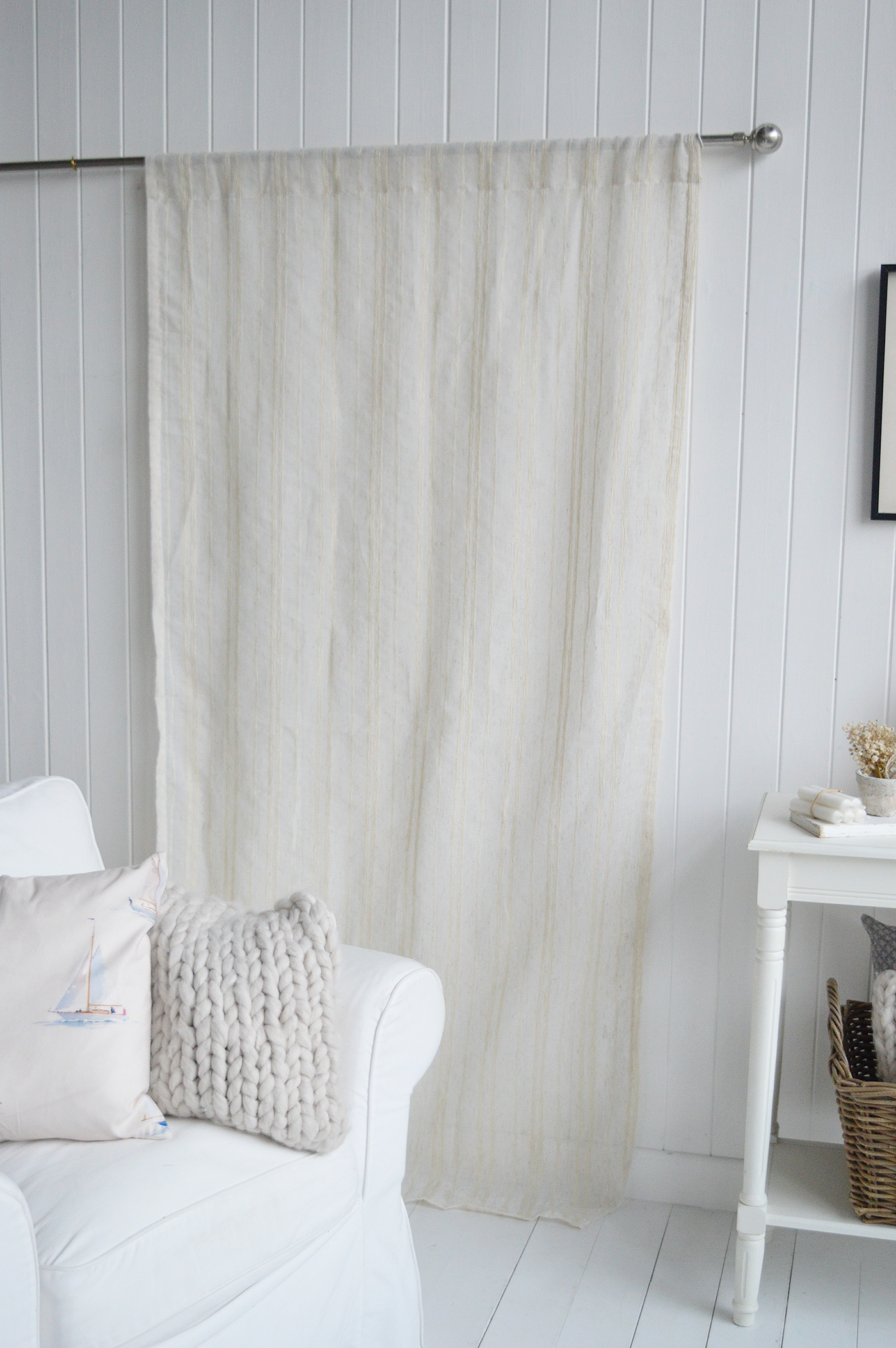 With its subtle stripe and natural woven finish, the Ivory Haven Stripe Curtain creates a calm and inviting window setting.
