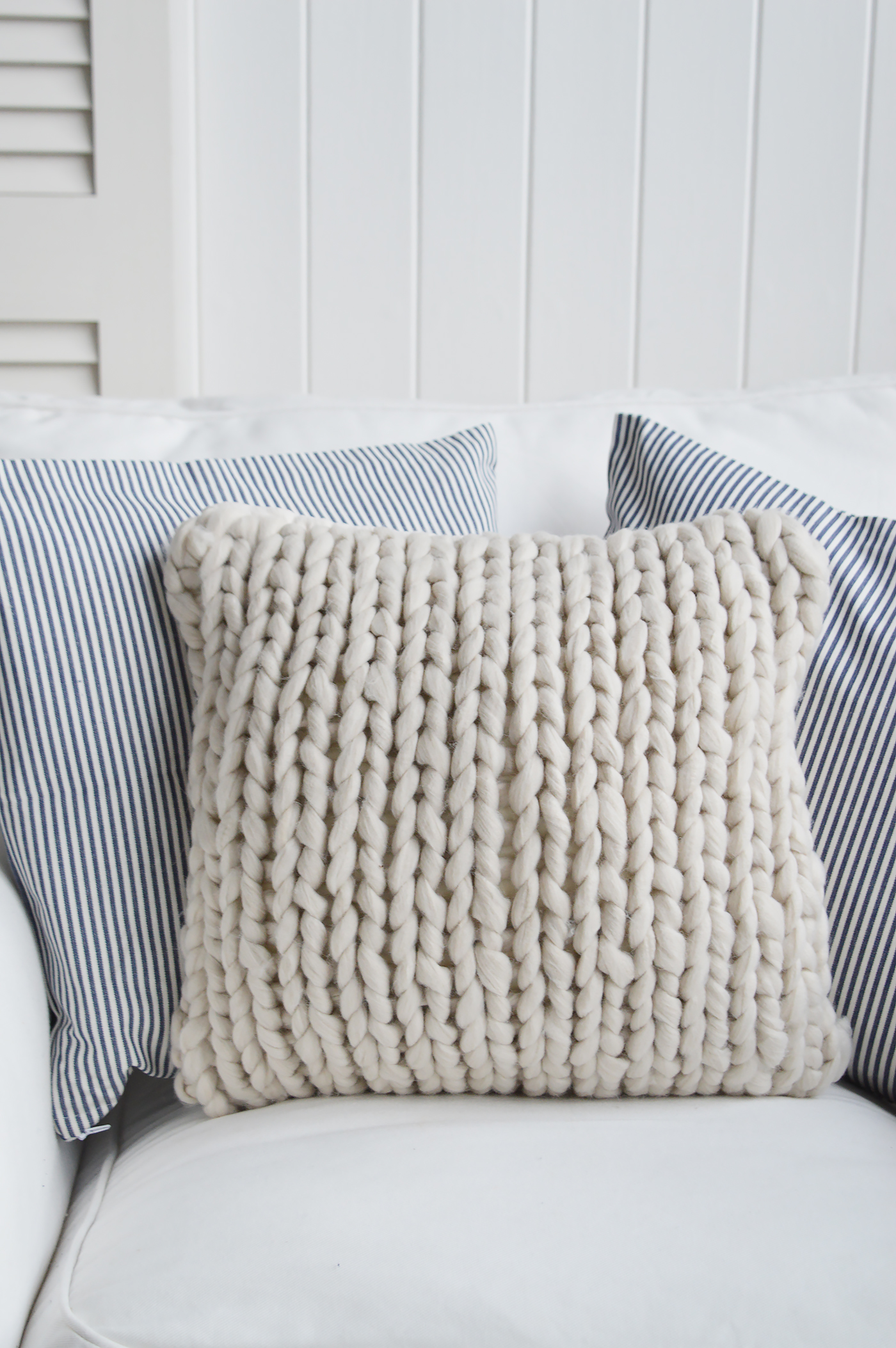 Chunky knitted cushion cover in ivory