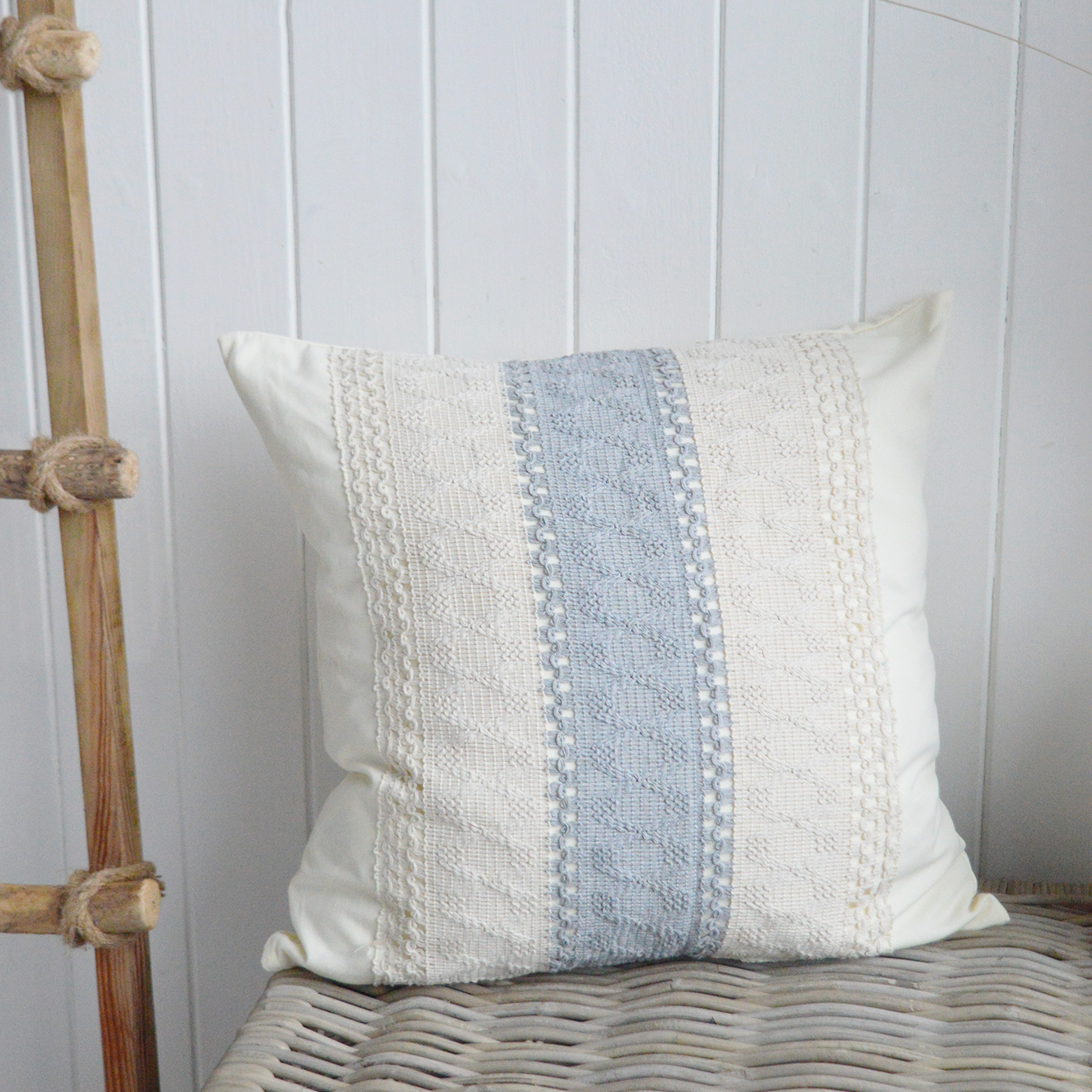 Pair this blue and off-white cushion cover with neutral sofas, navy throws and natural wood furniture for an inviting modern coastal look.