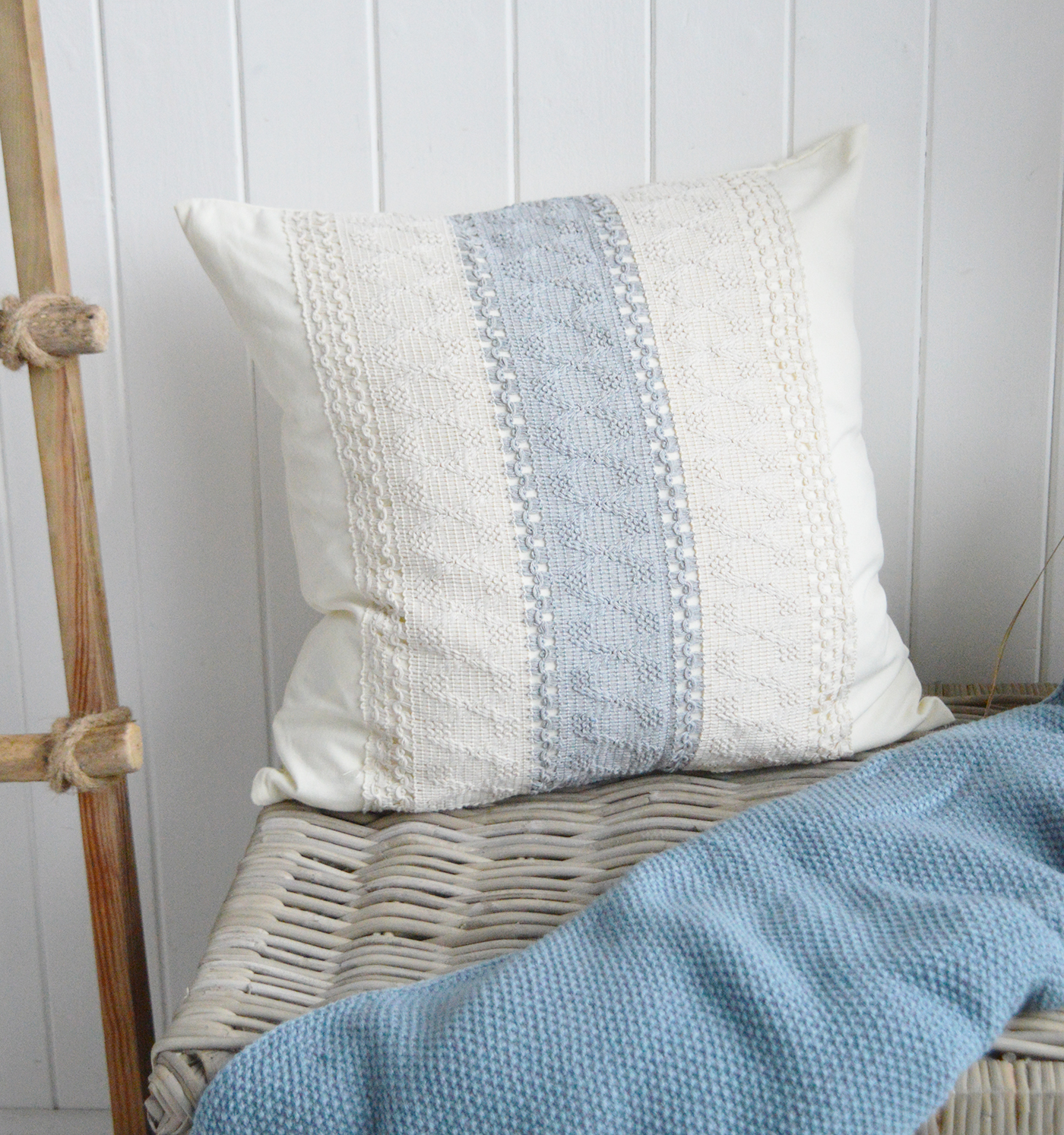 The Westport blue and cream cushion cover brings textured diamond detailing and soft colour to New England living rooms
