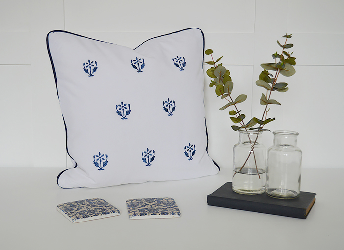 The White Lighthouse. Navy blue and White Floral Cushion Cover. New England and White Home Interiors and furniture