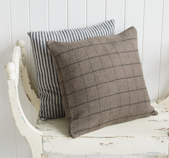 New England style interiors. A cushion in taupe and black check