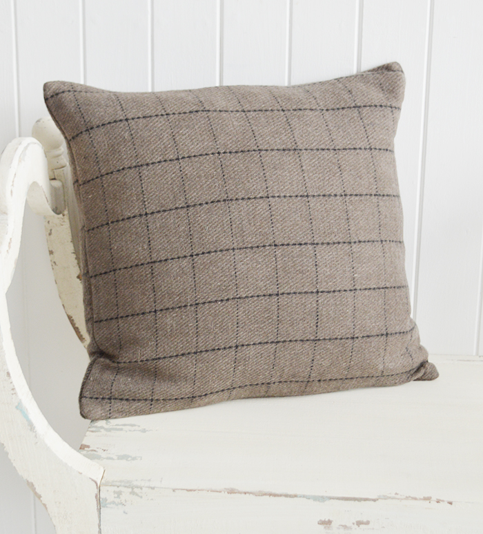 New England style interiors. A cushion in taupe and black check