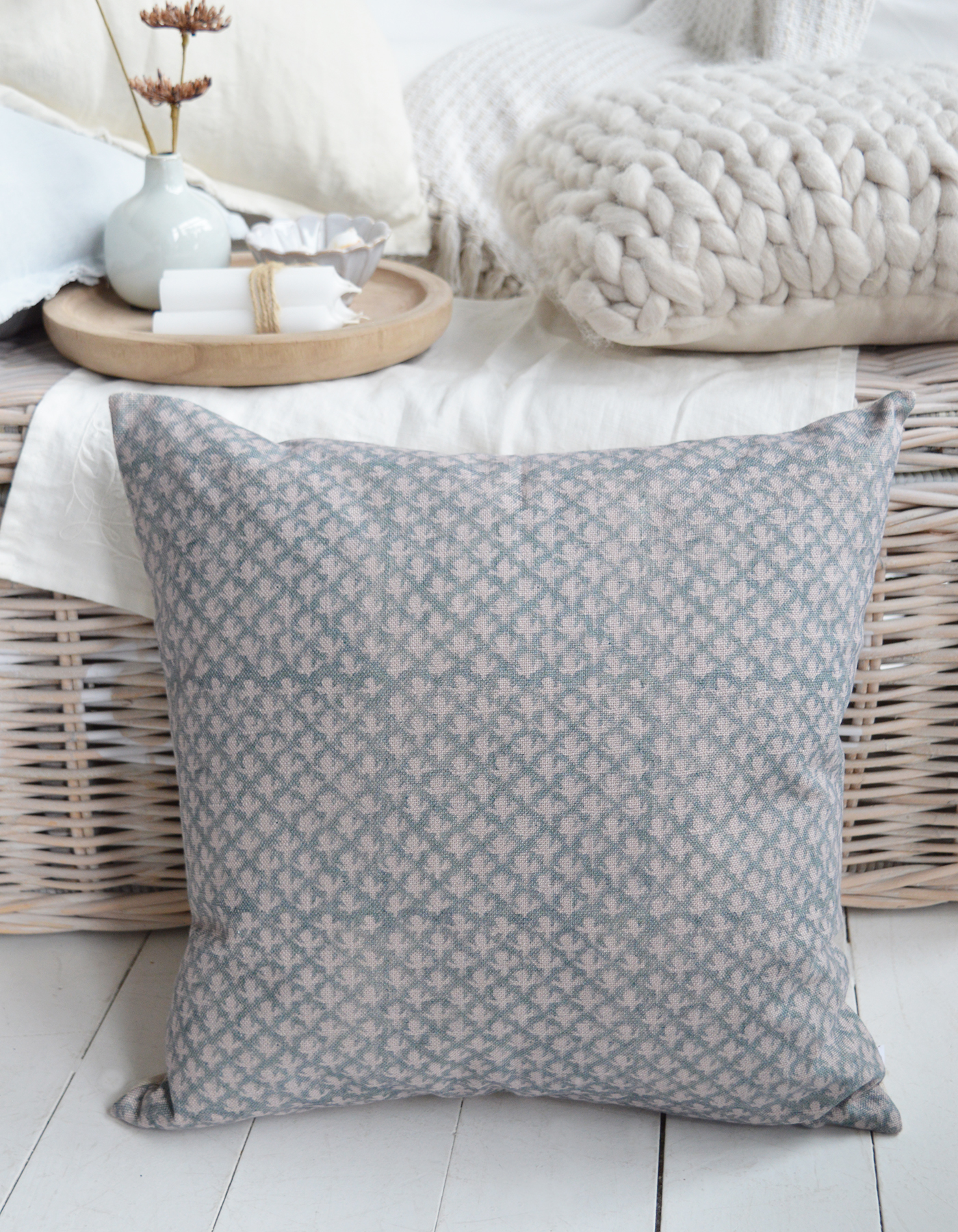 Close-up detail of high-quality coastal cushion fabric with soft tones
