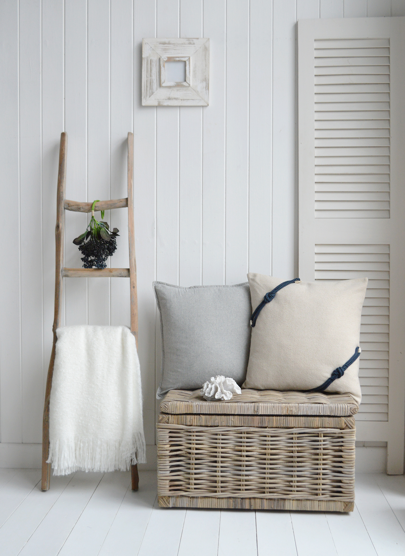 Navy blue, whites and linens cushions for chic Hamptons styled interiors