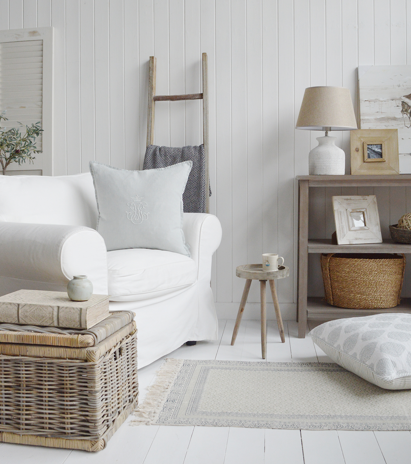 New England styled interiors - rustic wooden Pawtucket round stool alomng with the Cambridge console table, and other piecec of coastal furniture and shwoung th new Richmond pale linen cushion