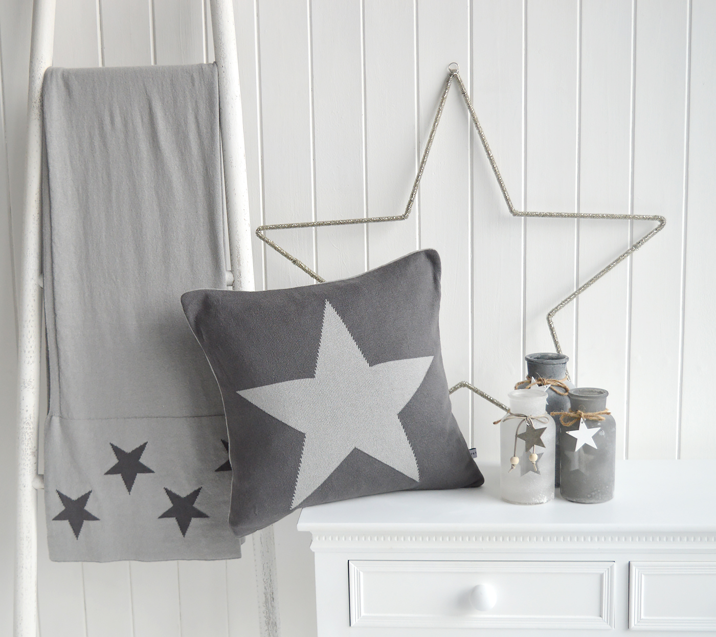 The White Lighthouse Furniture. New England style cushions and throw. Grey and white star filled cushion in square and rectangle for country, coastal and city homes