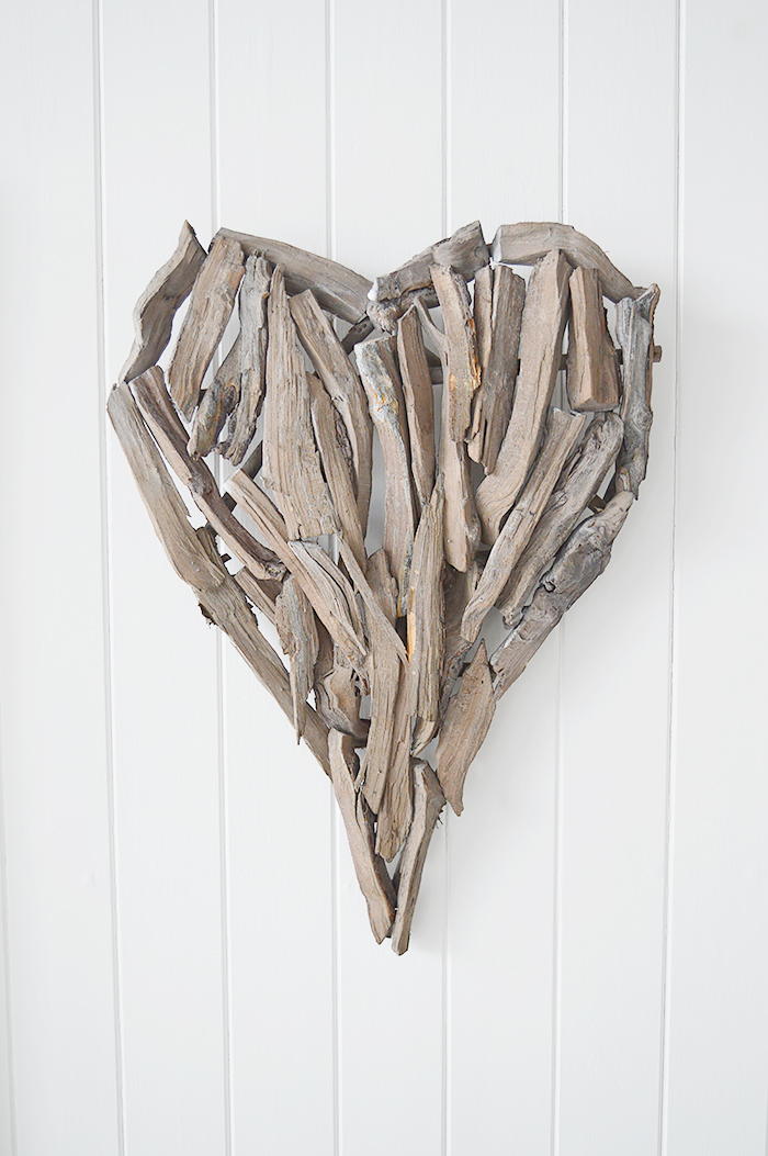 A decorative heart made from pieces of driftwood that can be wall hung or set on a shelf or table top.  In a rustic styled finish, the heart can be incorporated into a country, cottage or coastal interior design. from The White Lighthouse