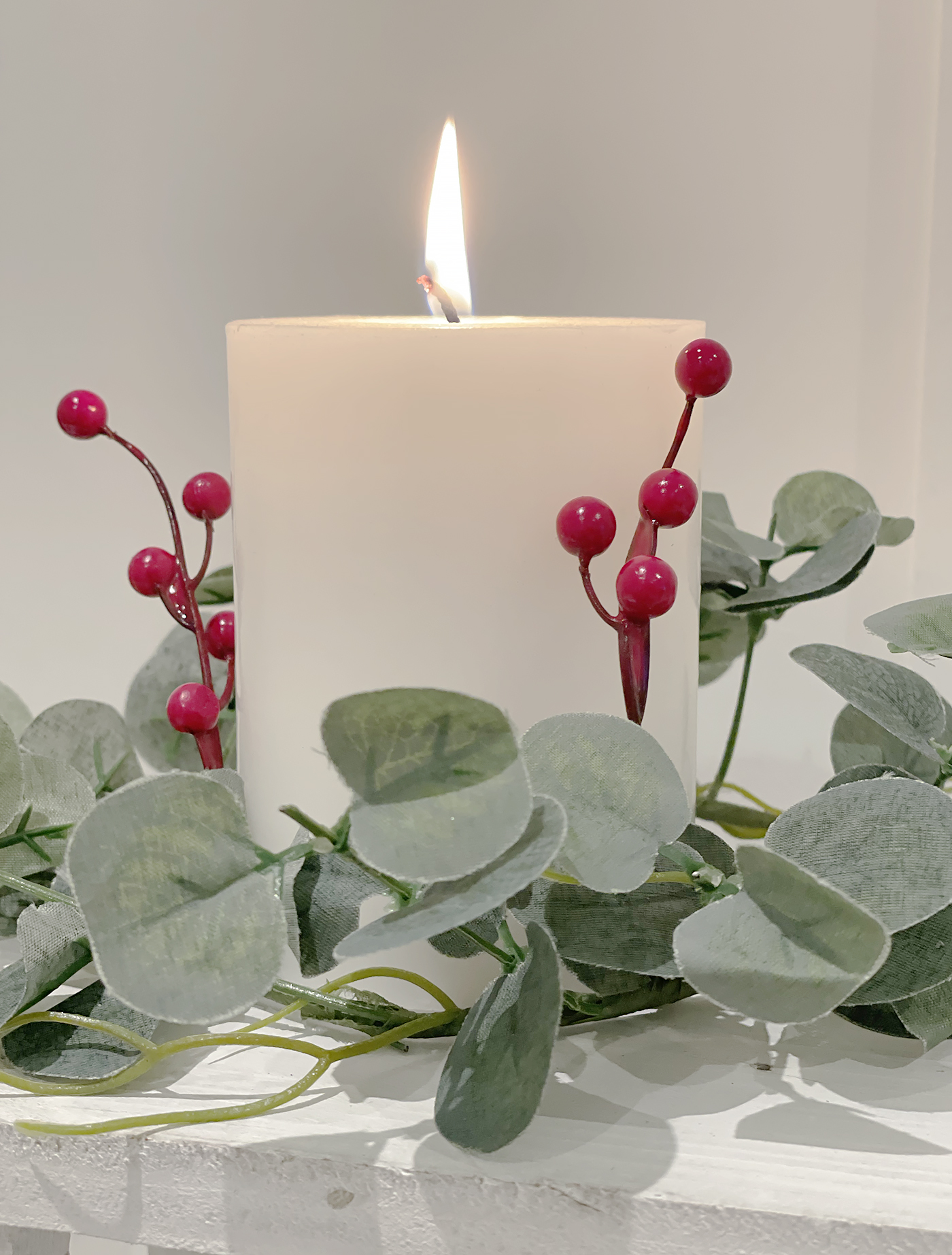 Eucalyptus Candle Ring with red berries for New England Home Interiors and Furniture