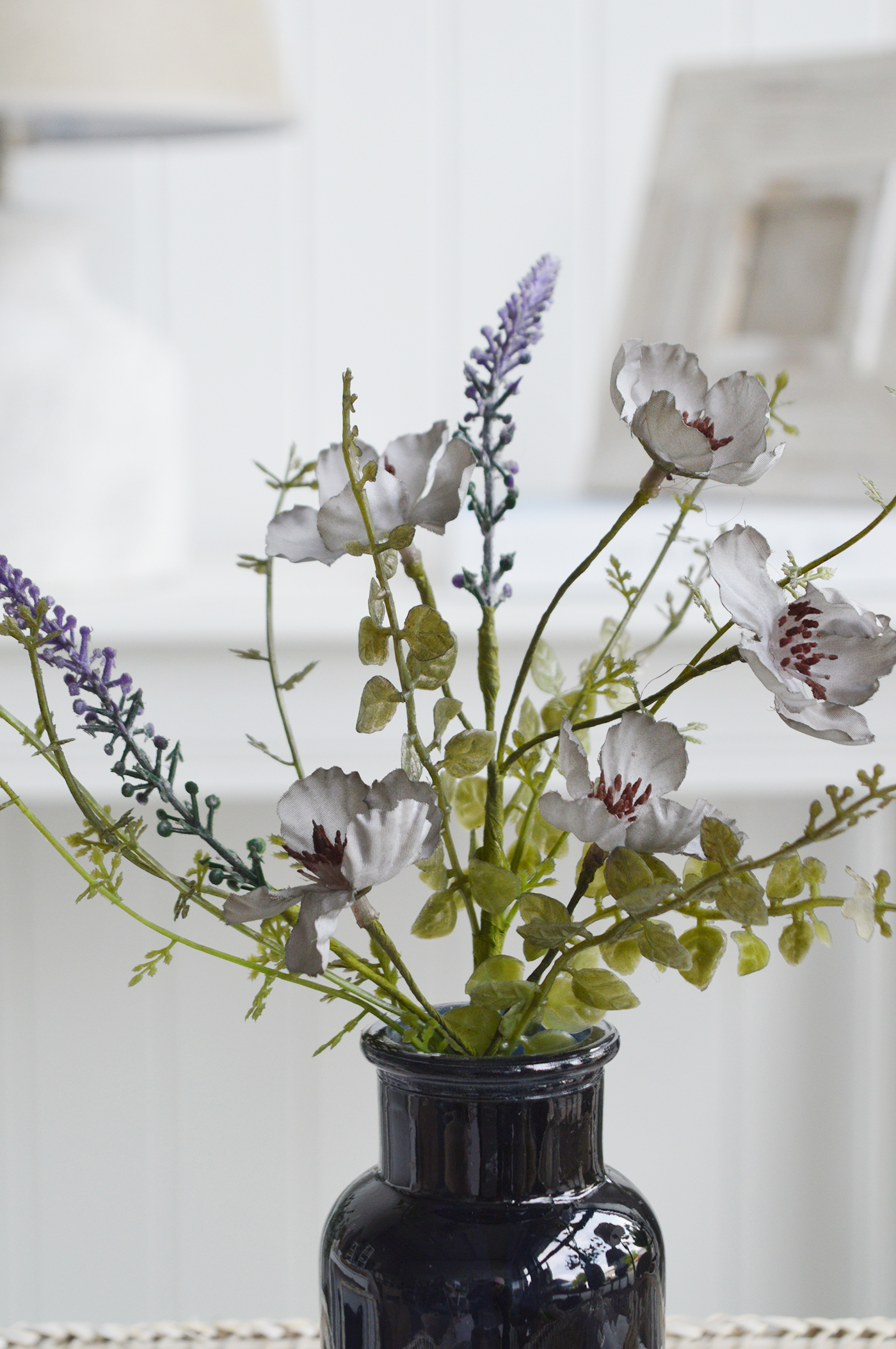 White Furniture and accessories for the home. Faux flowers and greenery - Little Blue Wild Rose spray for styling New England style  interiors. Farmhouse, country, coastal and city homes