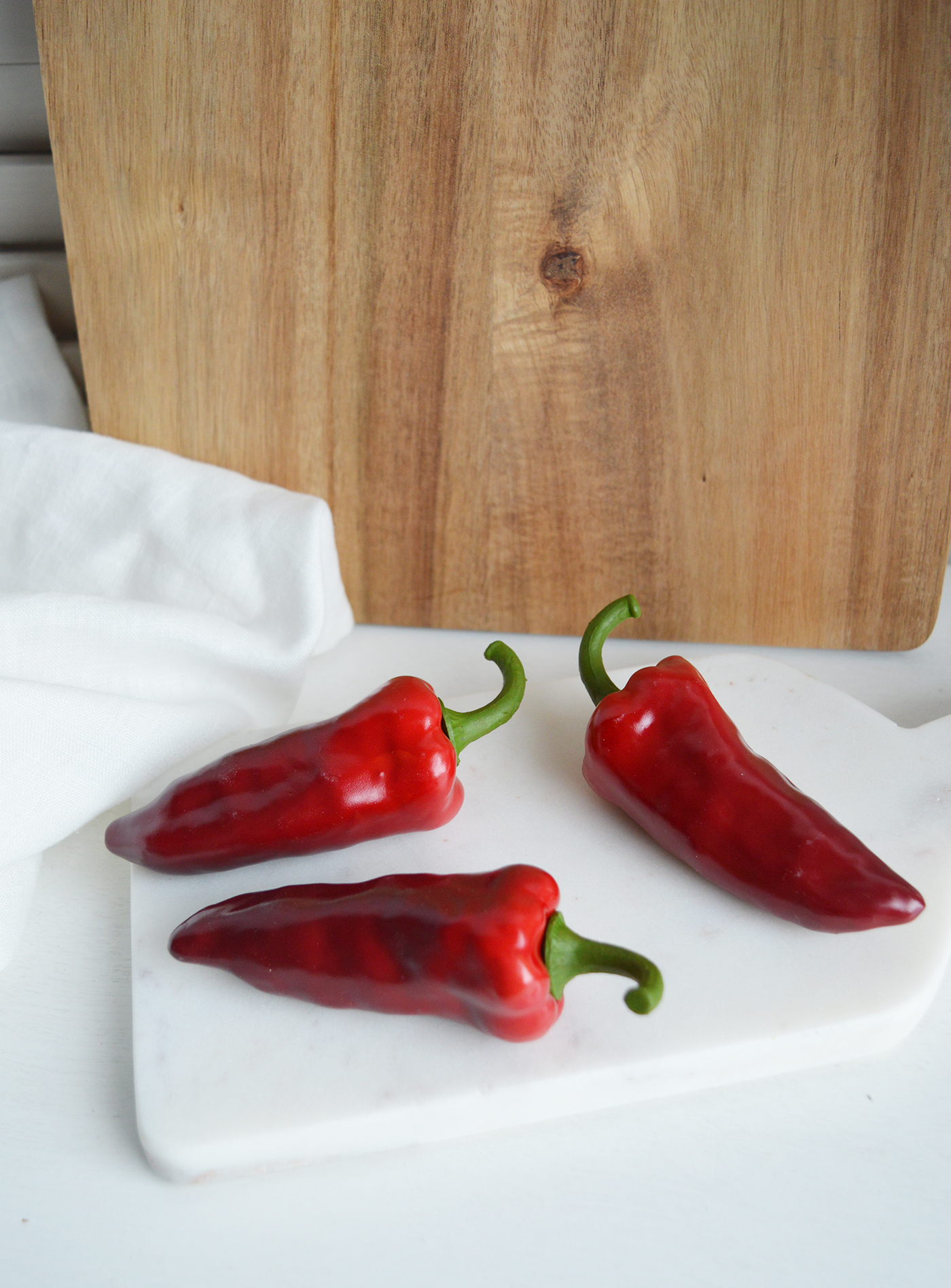 Decorative realistic faux red chillis - New England interiors for modern farmhouse and coastal interiors