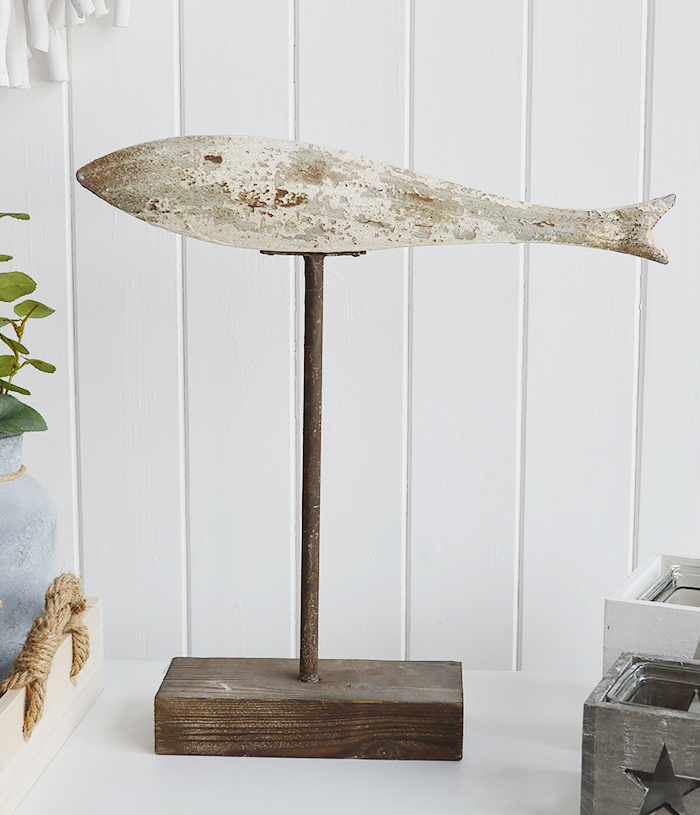 Sitting on top of a weathered stand, the large distressed wooden fish in whites, blues and greys will definitely make a statement in a coastal styled home. The White Lighthouse Furniture