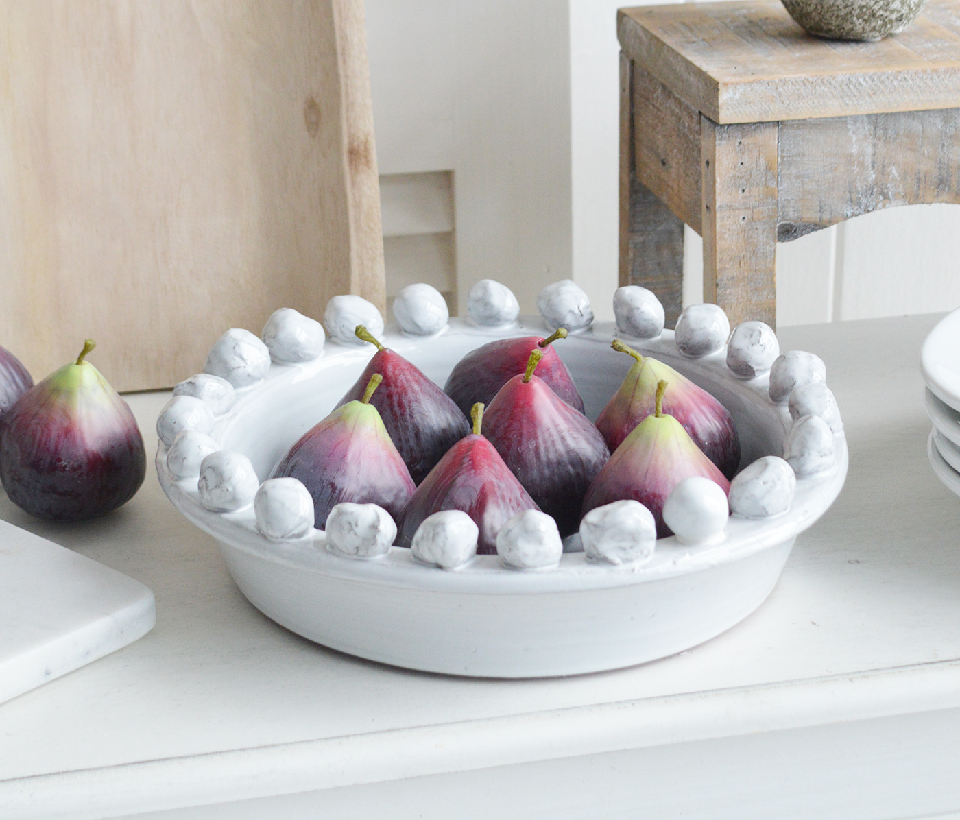 White ceramic fruit bowl with bobbles with realistic artificial decorative figs to create a forever dispaly for your New England coastal and country home interior