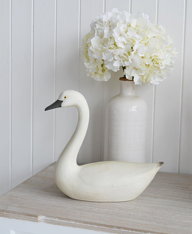 Decorative swan or goose on table for living room interiors.