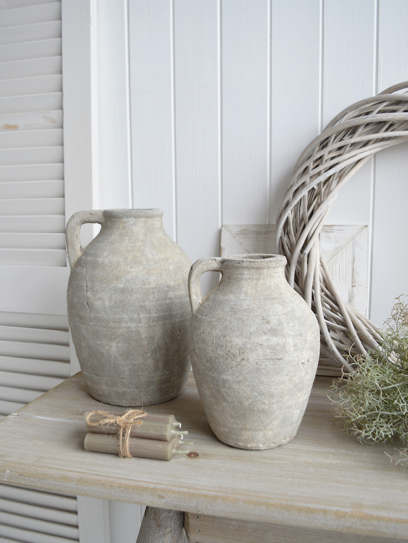 Perfect for a weathered farmhouse table or a breezy seaside mantel, the raw, hand-finished surfaces of the Harmony stone vases create a beautifully understated focal point.