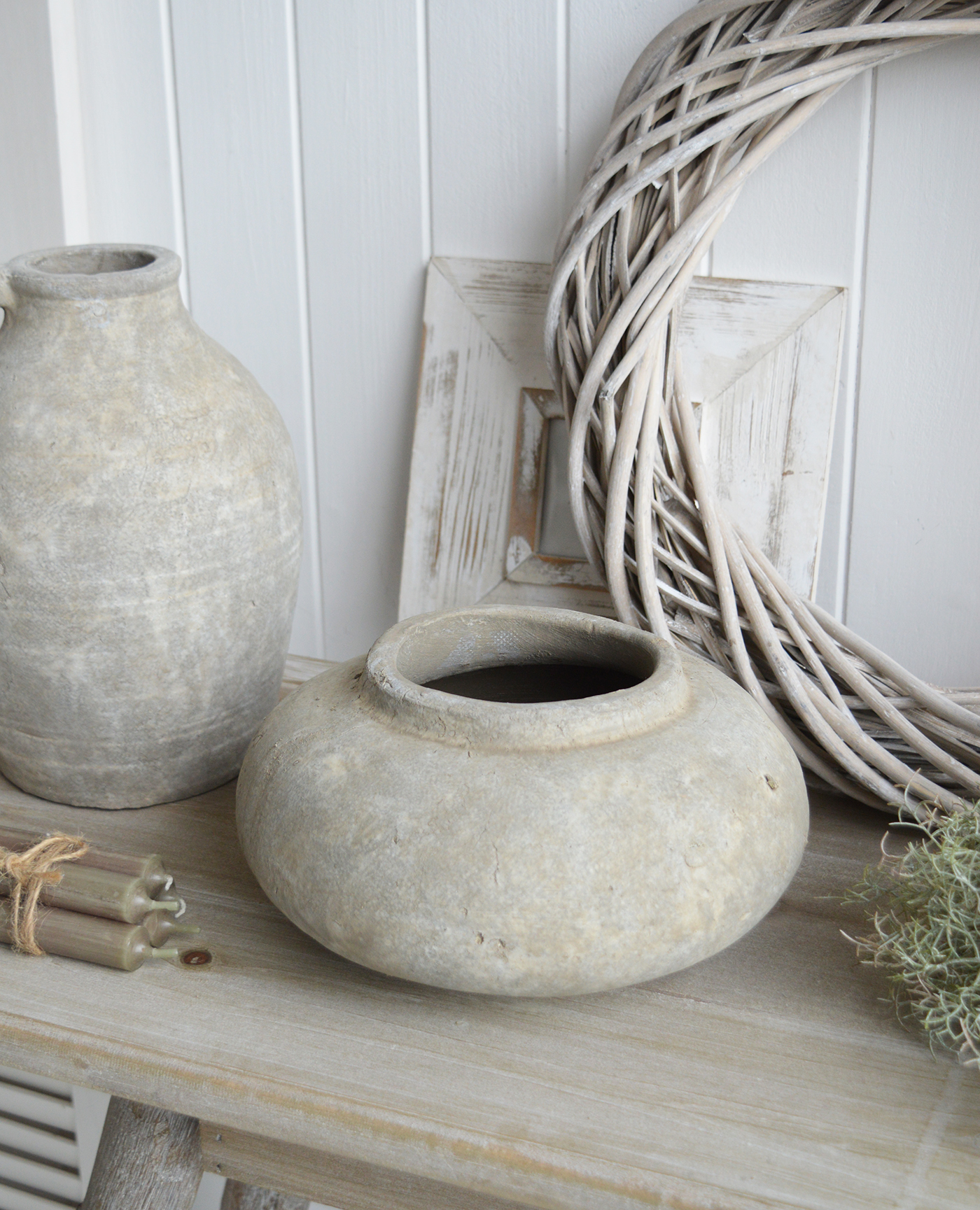 With a variety of shapes and sizes, from stately urns to rounded vessels, this collection offers versatile styling options for any rustic-inspired décor.