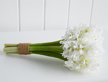 Real looking white bunch of artificial white Hyacinths