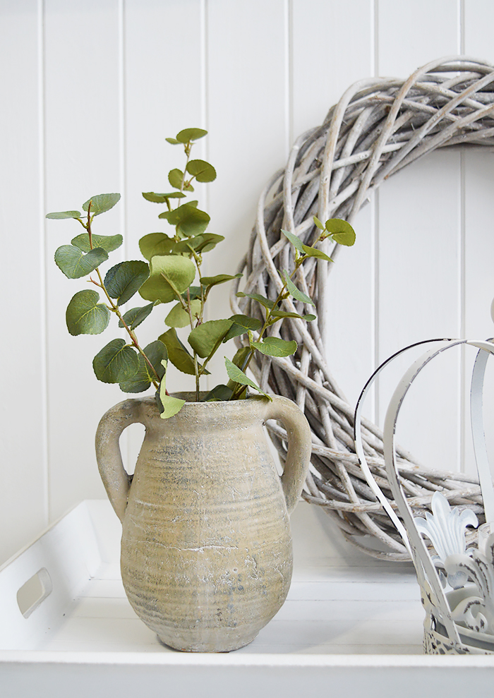 A rusctic grey stone jar with handles. 

Vintage charm and texture are in abundance with our beautiful piece of stoneware. 

In a grey stone finish, it is perfect to fill with our faux Eucalyptus or olive stalks. 