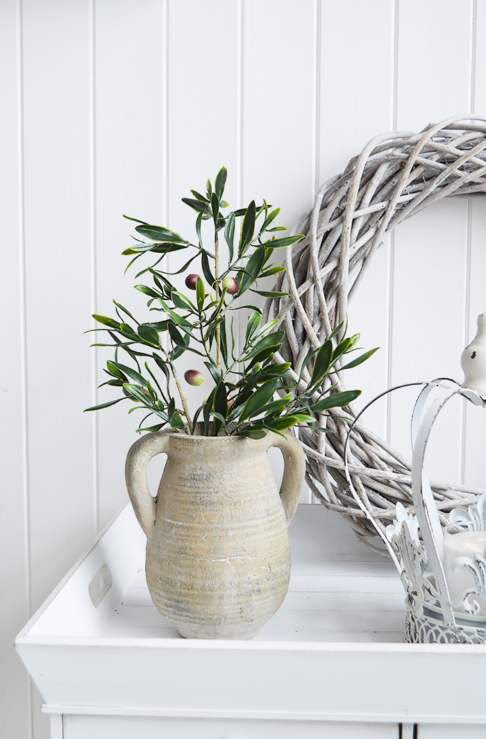 A rusctic grey stone jar with handles. Vintage charm and texture are in abundance with our beautiful piece of stoneware. In a grey stone finish, it is perfect to fill with our faux Eucalyptus or olive stalks. 