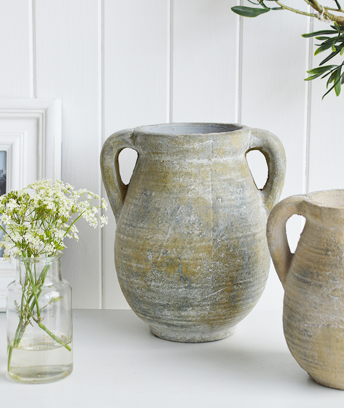 A rusctic grey stone jar with handles. Vintage charm and texture are in abundance with our beautiful piece of stoneware. In a grey stone finish, it is perfect to fill with our faux Eucalyptus or olive stalks. 