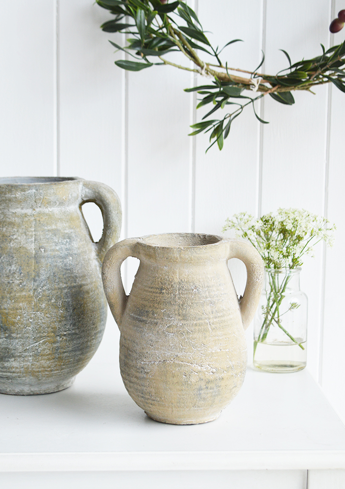 A rusctic grey stone jar with handles. Vintage charm and texture are in abundance with our beautiful piece of stoneware. In a grey stone finish, it is perfect to fill with our faux Eucalyptus or olive stalks. 