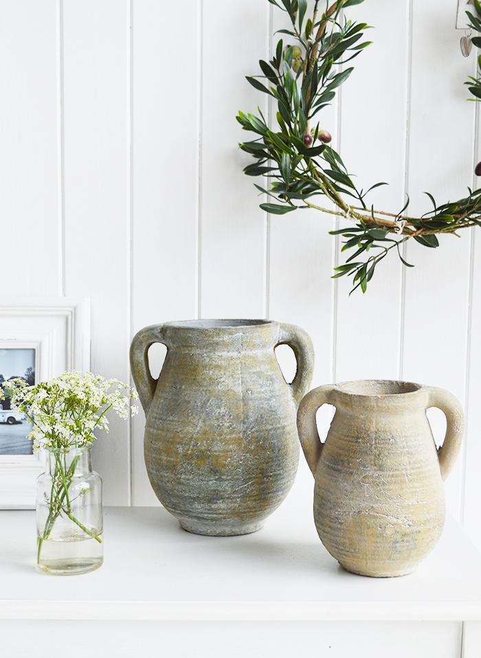 A rusctic grey stone jar with handles. 

Vintage charm and texture are in abundance with our beautiful piece of stoneware. 

In a grey stone finish, it is perfect to fill with our faux Eucalyptus or olive stalks. 