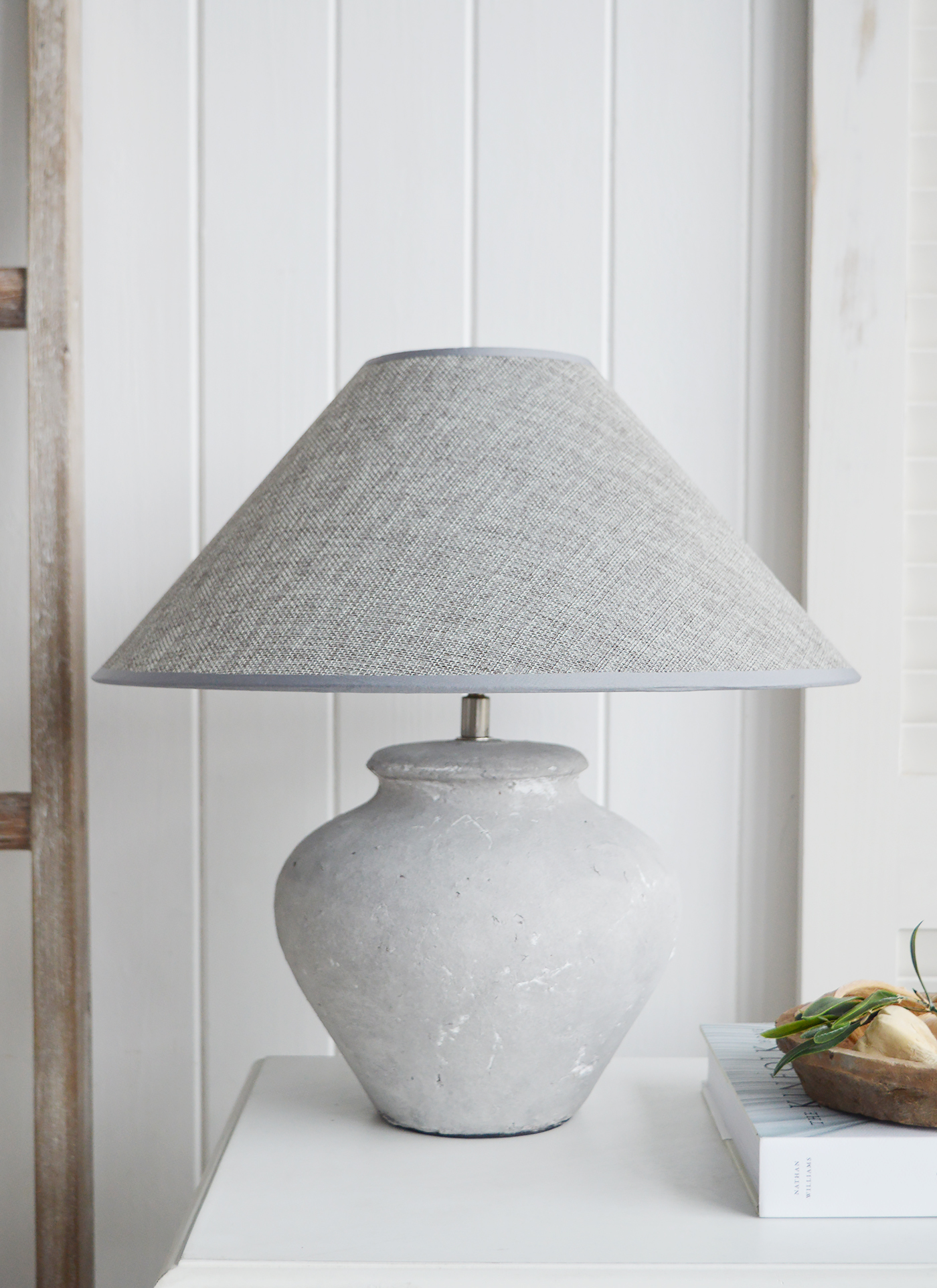 A grey  stone lamp from The White Lighthouse Furniture. A lovely table lamp for bedside table or living room or bedroom furniture. New England style table lamps for country, coastal, citu and farmhouse styled homes