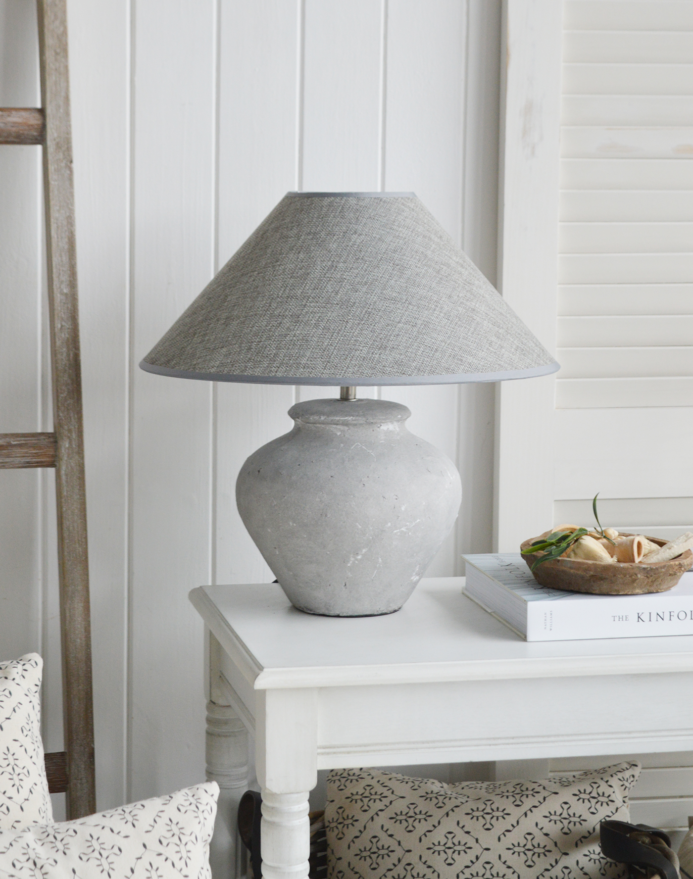 A grey  stone lamp from The White Lighthouse Furniture. A lovely table lamp for bedside table or living room or bedroom furniture. New England style table lamps for country, coastal, citu and farmhouse styled homes